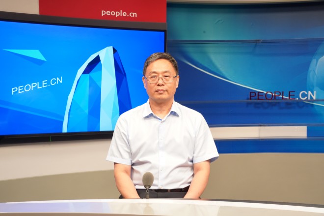 中國藝術研究院院長、黨委副書記周慶富做客人民網。張力洋攝